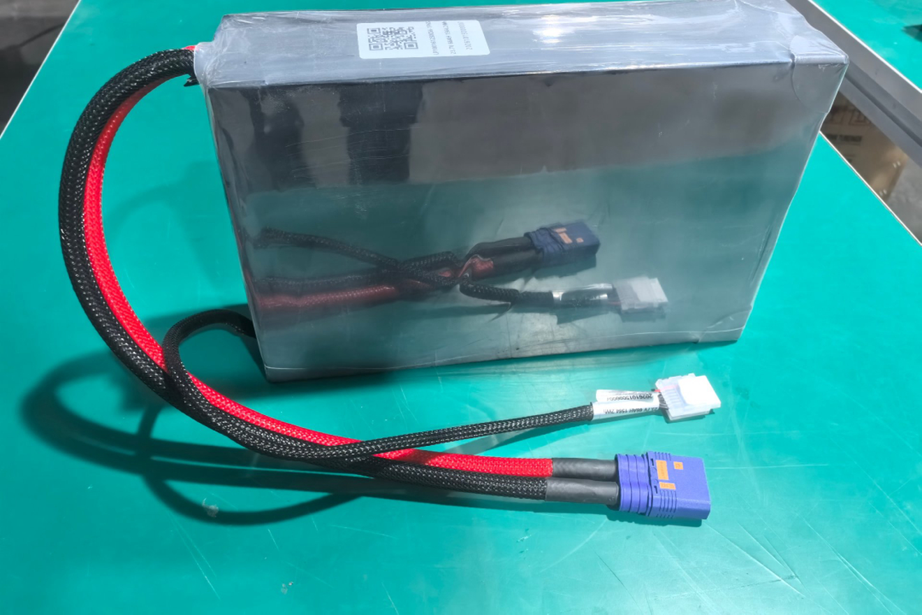 Sealed drone battery pack with balance lead and high current connector